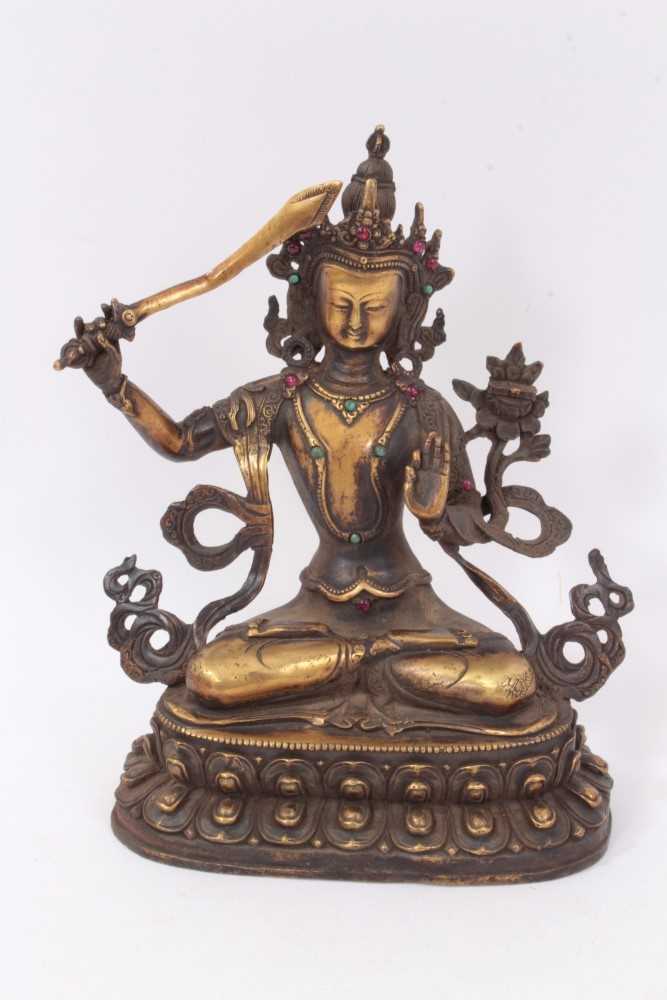 Lot 1192 - Antique Tibetan bronze figure of Majushri