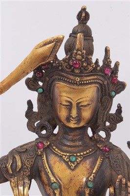 Lot 1192 - Antique Tibetan bronze figure of Majushri