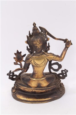 Lot 1192 - Antique Tibetan bronze figure of Majushri