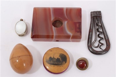 Lot 1139 - Mixed lot to include Agate bell-push, Mauchline pin cushion-canterbury scene, miniature compass, coquilla egg and a folding corkscrew (5)