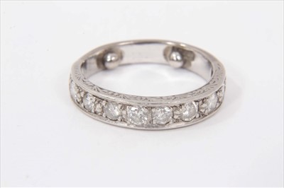 Lot 506 - Half hoop diamond eternity ring