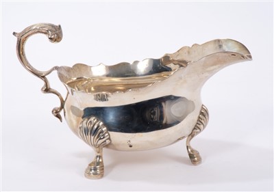 Lot 419 - 1930s silver sauce boat of conventional form.