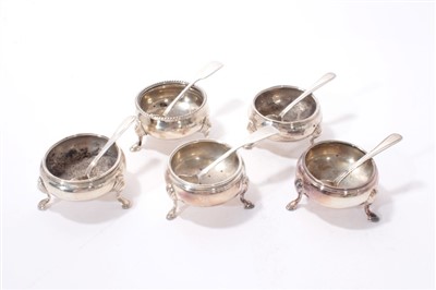 Lot 423 - Five Georgian and later silver cauldron salts, together with five condiment spoons.