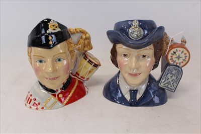 Lot 2074 - Royal Doulton Character Jug- Women's Royal Naval Service D7208, together with another North Staffordshire Drummer Boy D7211, both boxed (2)