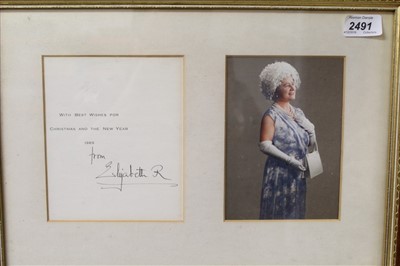 Lot 2491 - H.R.H. Queen Elizabeth the queen mother, official signed Christmas card, 1965, hand signed ‘from Elizabeth R’. In glazed frame.