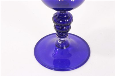 Lot 213 - A Venetian blue enamelled glass goblet