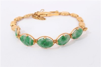 Lot 752 - Chinese gold and jade bracelet