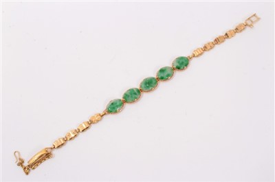 Lot 752 - Chinese gold and jade bracelet