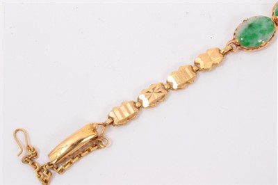 Lot 752 - Chinese gold and jade bracelet