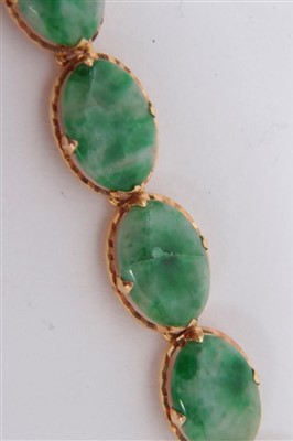 Lot 752 - Chinese gold and jade bracelet