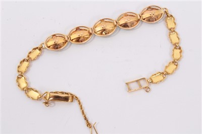 Lot 752 - Chinese gold and jade bracelet