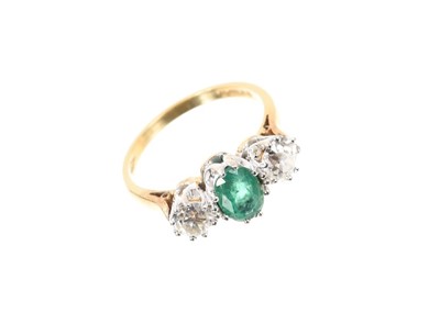 Lot 734 - Ladies diamond and emerald three stone ring