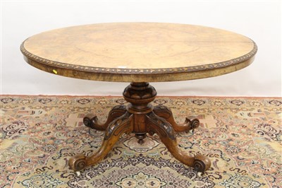 Lot 1640 - Victorian figured walnut oval loo table