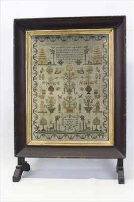 Lot 3126 - George IV period needlework sampler depicting figures, flowers and verse by Elizabeth Trill Aged 8 Years 1829, in glazed frame mounted as a fire screen