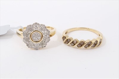 Lot 3328 - Diamond cluster ring with a flower head cluster of brilliant cut diamonds in 9ct gold setting, together with a cinnamon diamond 9ct yellow gold ring (2)