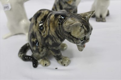Lot 2085 - Four Winstanley china cats