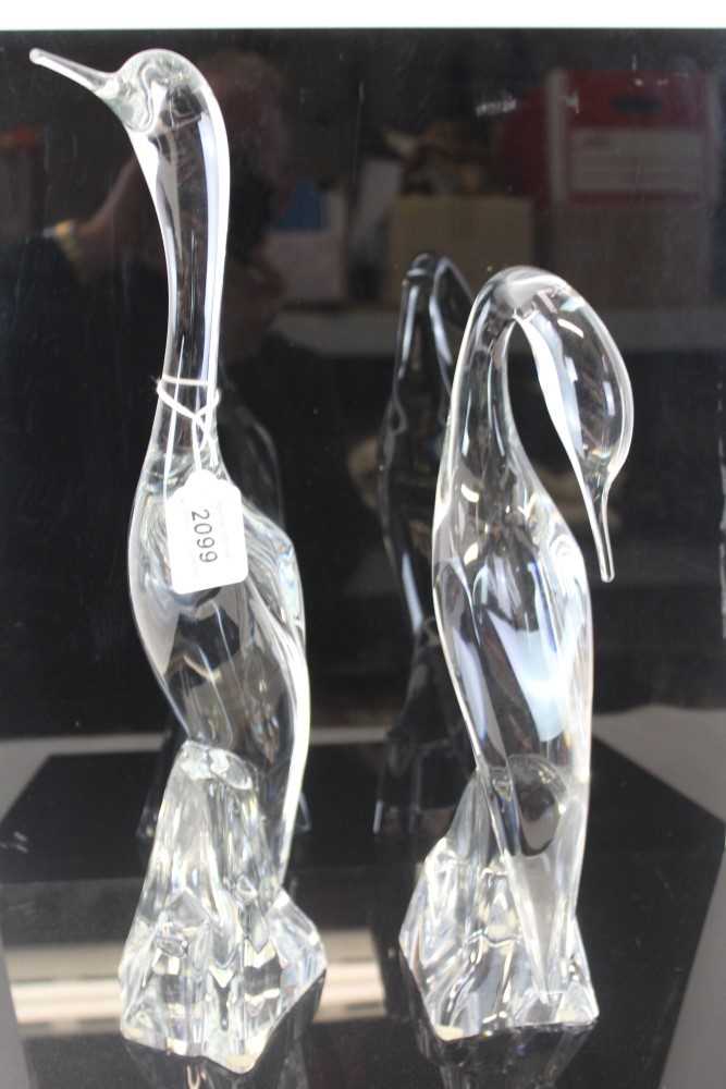 Lot 2099 - Two French Daum clear glass bird ornaments