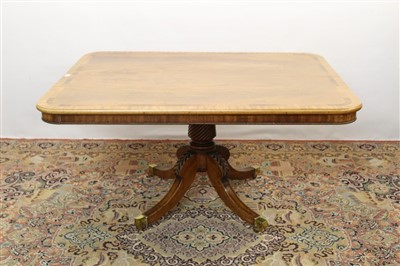 Lot 1707 - Regency mahogany breakfast table with rounded rectangular top, on four splayed legs and brass castors