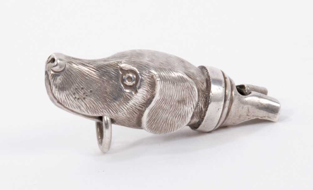 Lot 498 - Early Victorian silver novelty whistle in the form of a dog’s head.