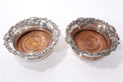 Lot 490 - Pair of 19th Century Old Sheffield Plate Wine coasters with vine leaf borders