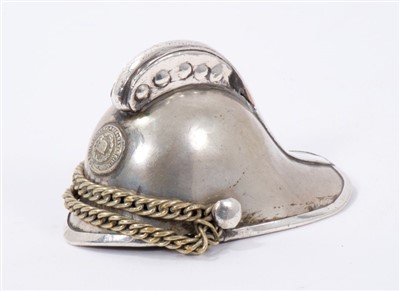 Lot 493 - Novelty white metal model of a Merryweather Fireman's helmet, with National Fire Bridge Union badge