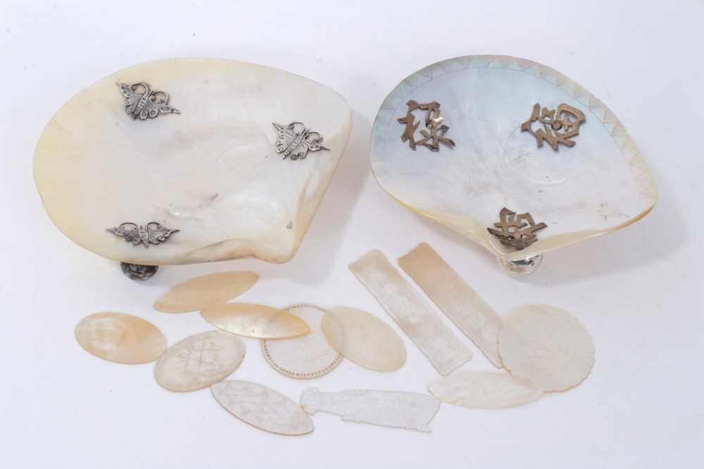 Lot 1267 - Pair of Chinese engraved mother-of-pearl dishes with white metal mounts, together with mother of pearl gaming counters