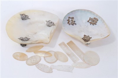 Lot 1267 - Pair of Chinese engraved mother-of-pearl dishes with white metal mounts, together with mother of pearl gaming counters