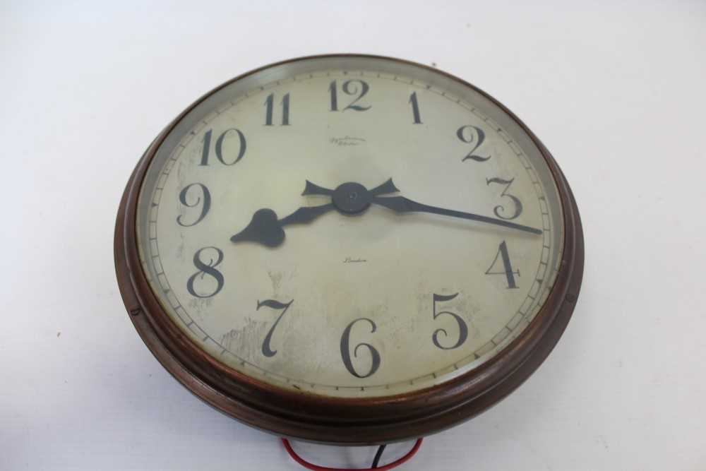 Lot 3531 - Synchronome Electric wall clock, the circular dial with black enamel Arabic numerals in anodised brass case. Formerly from Whitechapel Hospital, London. Working order 27.5cm diameter