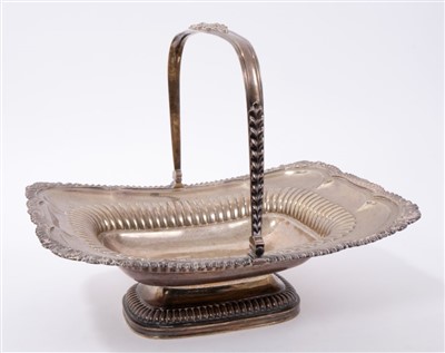 Lot 482 - Georgian silver cake basket with fluted decoration