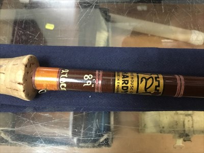 Lot 3523 - Two cased Hardy fishing rods together with another rod