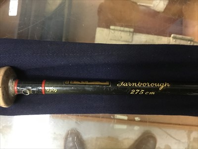 Lot 3523 - Two cased Hardy fishing rods together with another rod