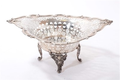 Lot 517 - Large Edwardian silver bonbon dish, raised on four scroll feet