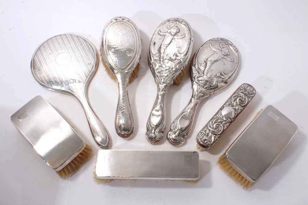 Lot 519 - Selection of  silver backed brushes and mirrors (8)