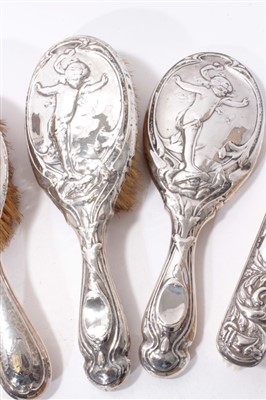 Lot 519 - Selection of  silver backed brushes and mirrors (8)