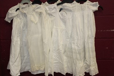 Lot 3070 - A selection of vintage fine lawn and cotton baby dresses and gowns. Includes Ayrshire white work embroidery and decorated net.