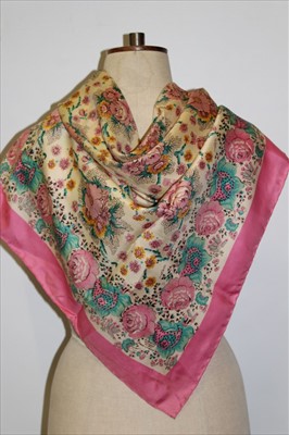 Lot 3071 - A box of silk scarves and wraps including two Liberty scarves, striped silk scarves with knotted fringing, fine knit shawl, black Chantilly lace shawl and an Indian Bandhani dyed shawl.