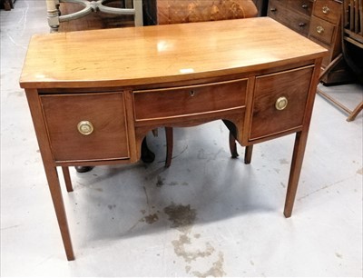 Lot 888 - Late nineteenth century mahogany bow front sideboard with three drawers, on square taper legs