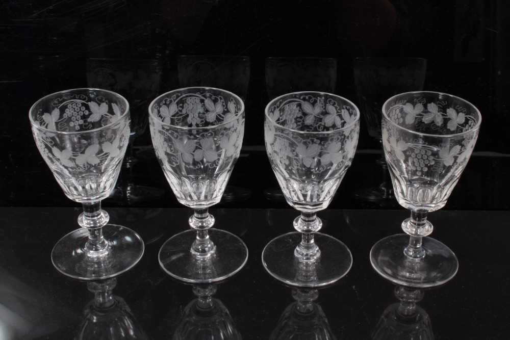 Lot 377 - Collection of twenty-nine late Victorian sherry and liquor glasses with etched vine and leaf borders