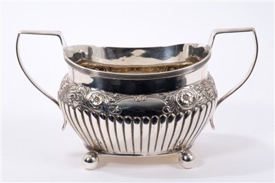 Lot 542 - George III silver two-handled sugar bowl of half-fluted form, with floral decoration.