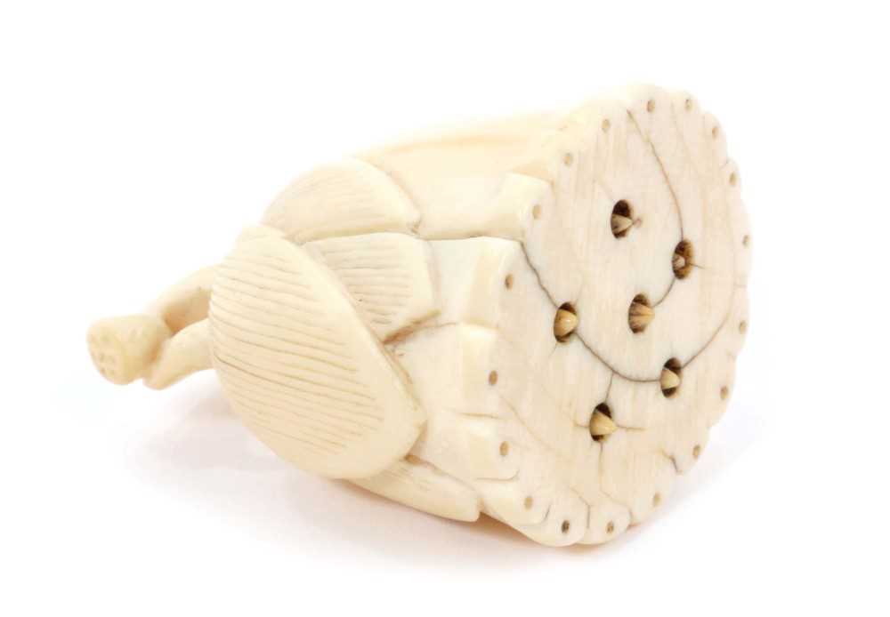 Lot 1121 - Unusual Japanese carved ivory netsuke