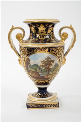 Lot 229 - Good Quality Early 19th Century Derby two handled pedestal vase, painted with a named view of 'In Westmorland', on a cobalt blue and gilded ground, with inscribed marks to base, 22.5cm height.