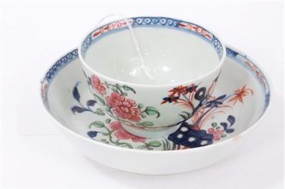 Lot 238 - Late 18th Century Lowestoft teabowl and saucer, painted in the Redgrave pattern.