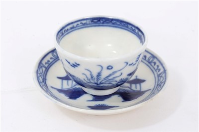 Lot 241 - Late 18th century Caughley miniature (toy) blue and white tea bowl and saucer, painted with the Island pattern