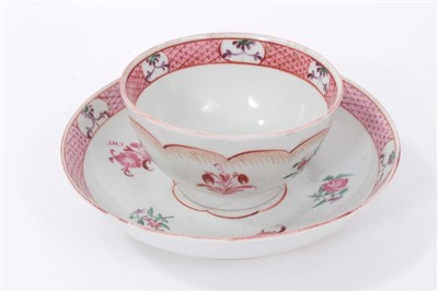 Lot 242 - Late 18th century English porcelain tea bowl and saucer, attributed to the Baddeley-Littler factory, painted in polychrome enamels with floral sprays.