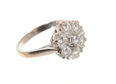 Lot 679 - Diamond cluster ring with seven brilliant cut diamonds in 18ct white gold setting