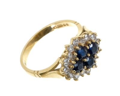 Lot 684 - 18ct sapphire and diamond cluster ring