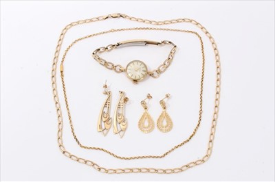 Lot 3269 - Group of gold and yellow metal jewellery to include earrings, chains and gold cased wristwatch on plated bracelet