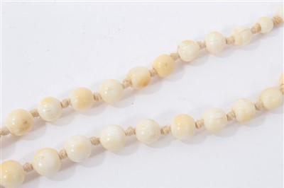 Lot 738 - Antique ivory bead necklace with a string of 119 graduated ivory beads ranging from 3.75mm - 23mm. Length 137cm.