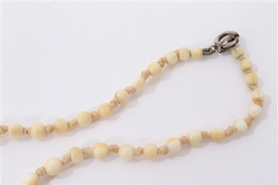 Lot 738 - Antique ivory bead necklace with a string of 119 graduated ivory beads ranging from 3.75mm - 23mm. Length 137cm.