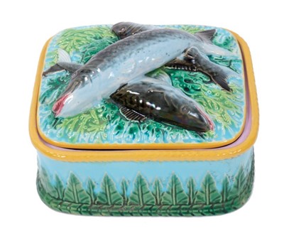 Lot 273 - Victorian George Jones majolica sardine dish, of oblong form, decorated in bold colours, with three sardines in relief to the lid, and foliage around the bottom part, mark to base, 14.5cm across.